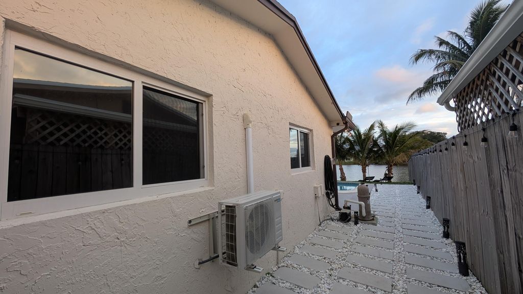 Photo of 11640 NW 32nd Manor, Sunrise, FL 33323 (MLS # B26018157)