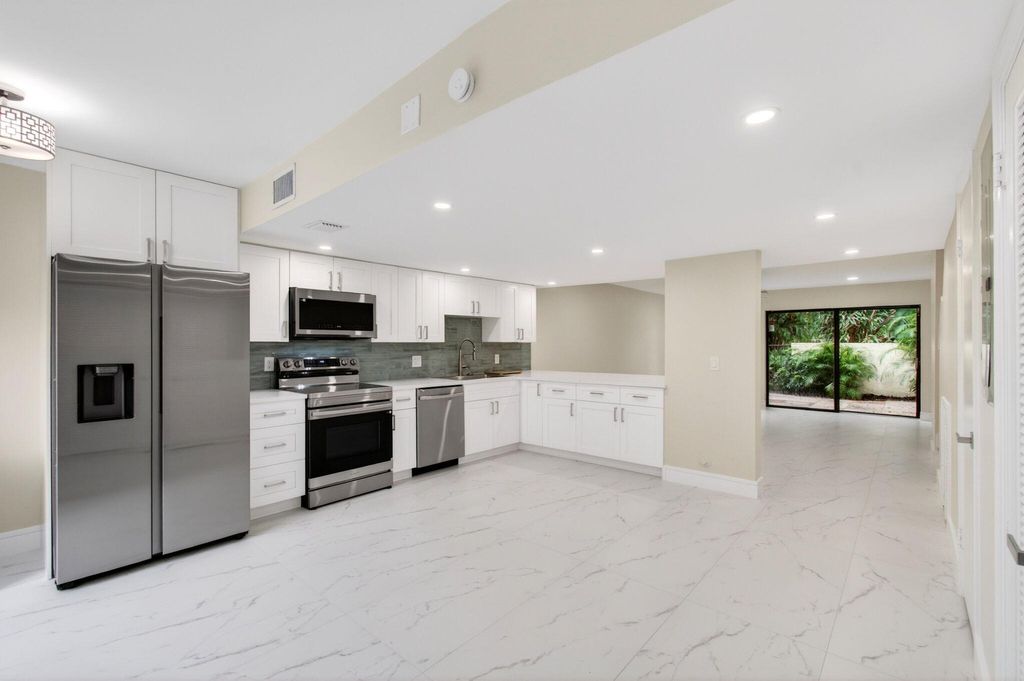 Photo of 1330 NW 13th Street #12, Boca Raton, FL 33486 (MLS # B26034766)