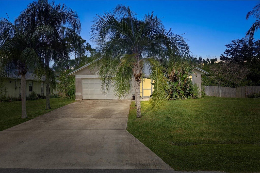Photo of 764 NE Eastlake Street, Port Saint Lucie, FL 34983 (MLS # B26071352)