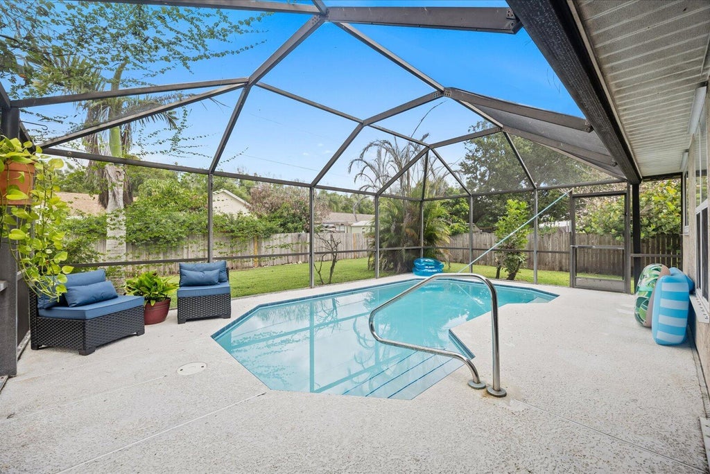 Photo of 764 NE Eastlake Street, Port Saint Lucie, FL 34983 (MLS # B26071352)