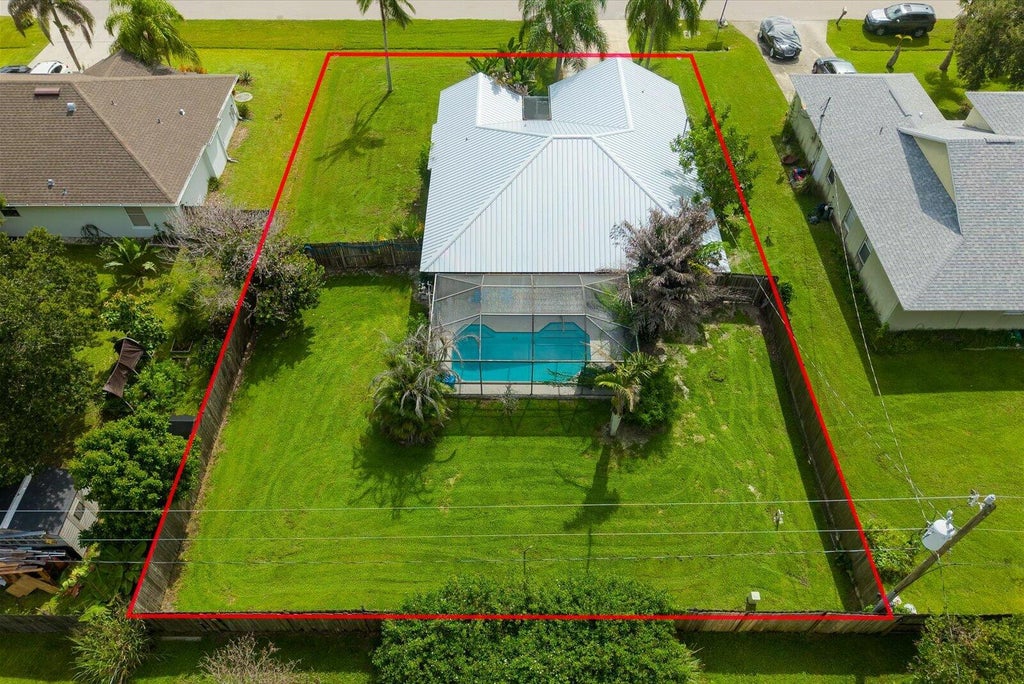 Photo of 764 NE Eastlake Street, Port Saint Lucie, FL 34983 (MLS # B26071352)