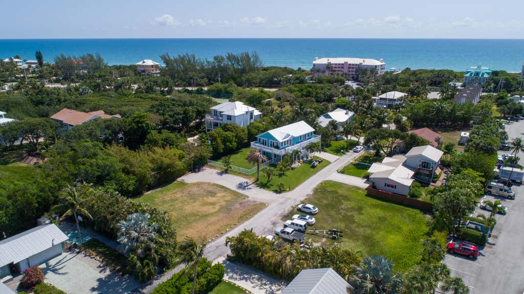 Photo of 5157 NE Shore Village Terrace, Hutchinson Island, FL 34996 (MLS # B26034944)