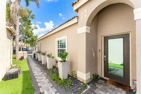 Photo of 3982 NW 62nd Ct, Coconut Creek, FL 33073 (MLS # F10532984)
