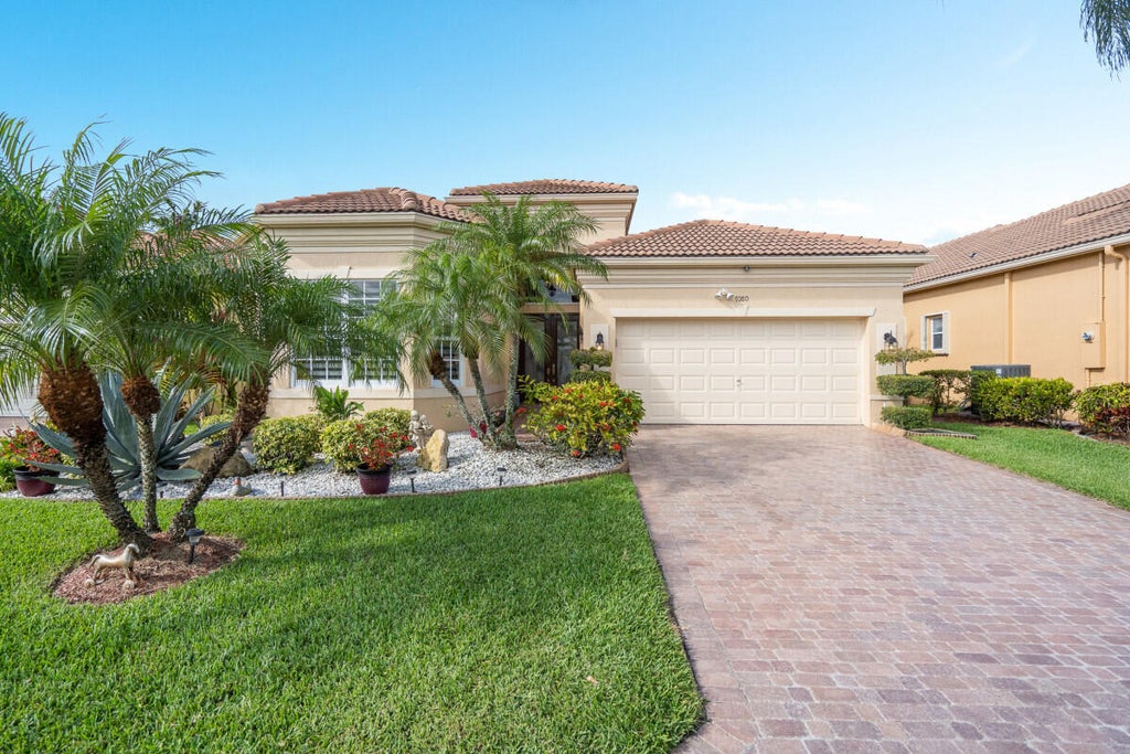 Photo of 7080 Demedici Circle, Delray Beach, FL 33446 (MLS # R10805413)