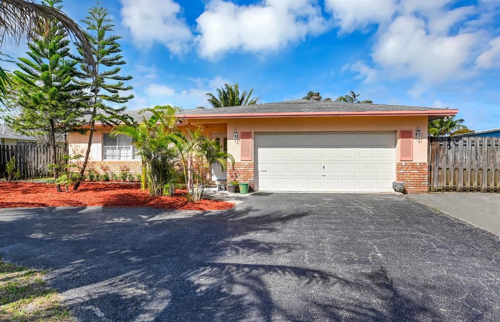 Photo of 1051 NW 45th Street, Fort Lauderdale, FL 33309 (MLS # R10691910)