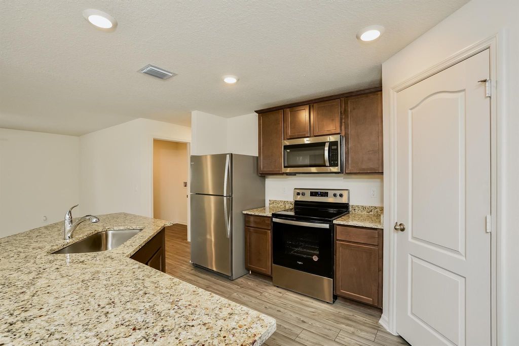 Photo of 2174 SW Wayne Street, Port Saint Lucie, FL 34984 (MLS # R11053001)