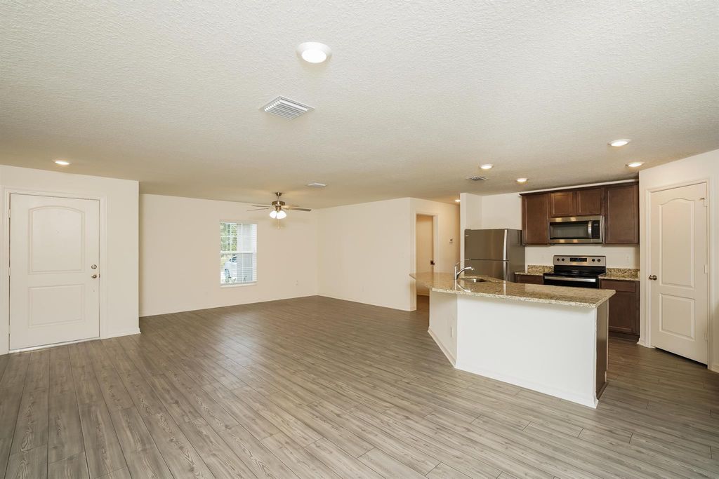 Photo of 2174 SW Wayne Street, Port Saint Lucie, FL 34984 (MLS # R11053001)