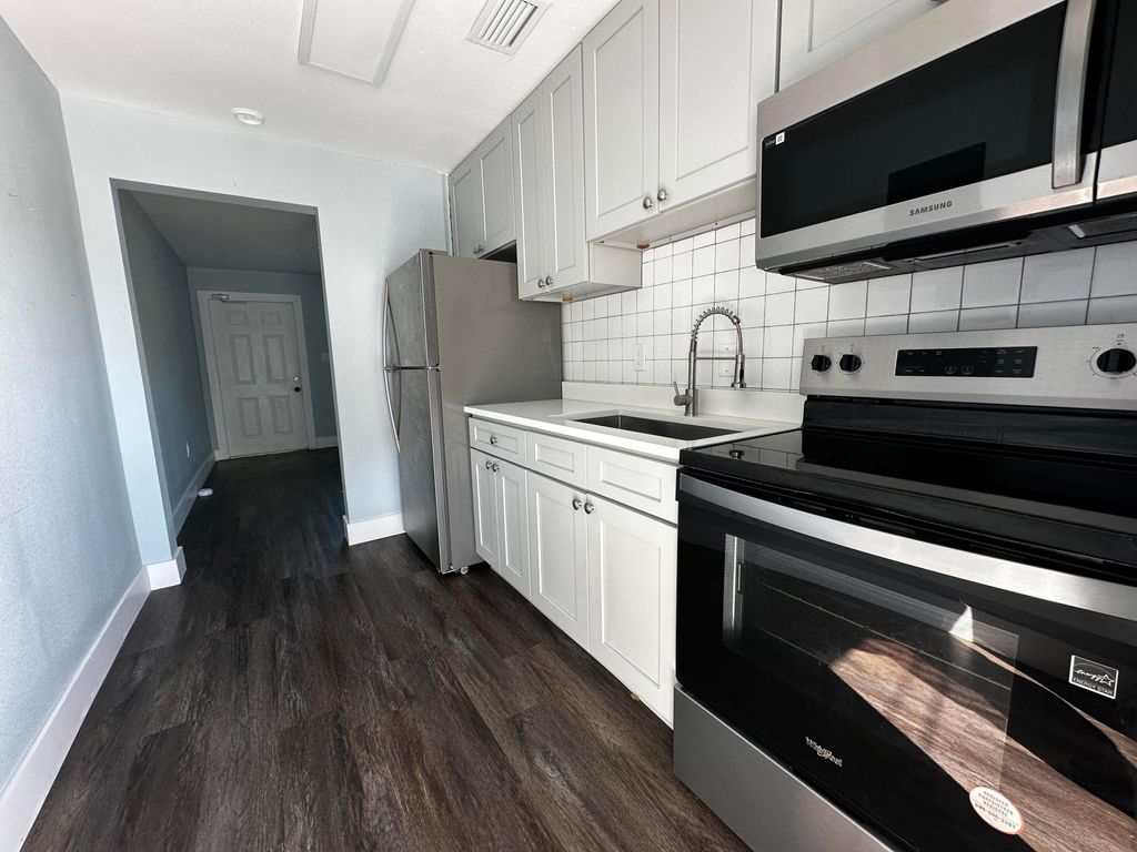 Photo of 711 N 23rd Street #A, Fort Pierce, FL 34950 (MLS # R11159793)