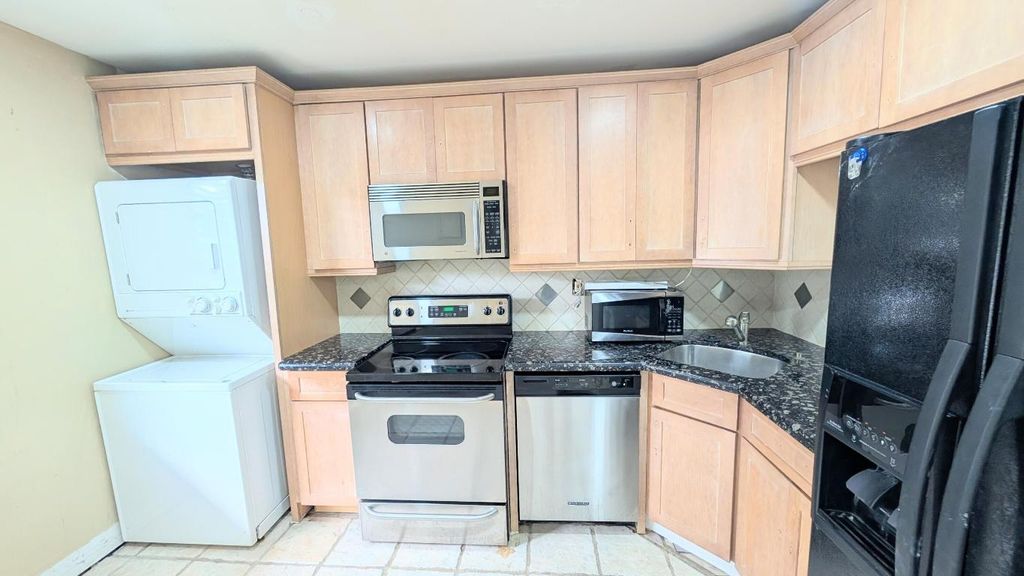 Photo of 860 SE 6th Avenue #205, Deerfield Beach, FL 33441 (MLS # R11133704)