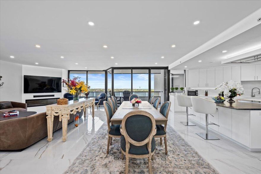 INTRODUCING RESIDENCE 1454 AT LAKE POINT TOWER, THE MOST COVETED COMPLEX LOCATED IN OLD PORT COVE....EXCEPTIONALLY WELL APPOINTED 2 BEDROOM, 2 1/2 BATH CONDOMINIUM FEATURING A GOURMET CHEF'S DREAM KITCHEN, COMPLETE WITH QUARTZ COUNTERTOPS AND BACKSPLASH, SUB-ZERO REFRIGERATOR, FULGAR COOKTOP AND DOUBLE OVEN, BEST VENT HOOD WITH EXTERNAL EXHAUST, AND CUSTOM DESIGNED CABINETS FOR EXCEPTIONAL STORAGE ..LAUNDRY ROOM OUTFITTED WITH A HIGH CAPACITY TANKLESS WATER HEATER, CUSTOM CABINETS AD FULL SIZE WASHER/DRYER.  42 INCH TILE ALLOVER