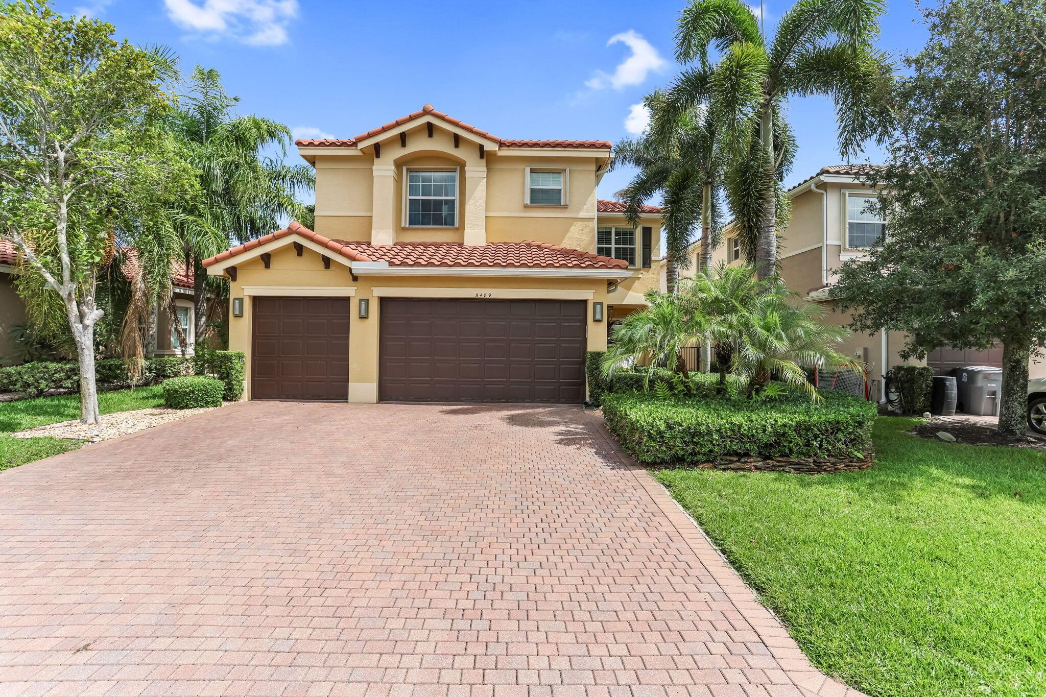 Welcome to this beautifully upgraded Acapulco model in the sought-after gated community of Canyon Trails, offering the ultimate Florida lifestyle with exceptional indoor-outdoor living. Perfectly positioned on a direct lakefront lot, this 4-bedroom + loft (optional 5th bedroom), 4-bathroom, 3-car garage home is hurricane protected and shows like a model.The backyard is an entertainer's dream--complete with a saltwater pool and hot tub, custom outdoor kitchen, putting green, and wireless sound system, all designed for seamless relaxation and hosting.Inside, you'll find a stunning chef's kitchen with new quartzite countertops, stainless steel appliances, ample cabinetry, snack bar seating, and a cozy breakfast nook. Additional upgrades include newer A/C, new floors,