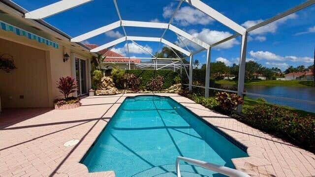 Photo of 7240 Deer Point Lane, West Palm Beach, FL 33411 (MLS # B26043123)