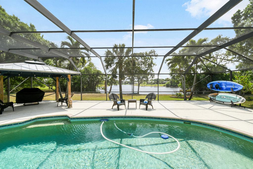 Photo of 582 SE Ashley Oaks Way, Stuart, FL 34997 (MLS # R10977431)