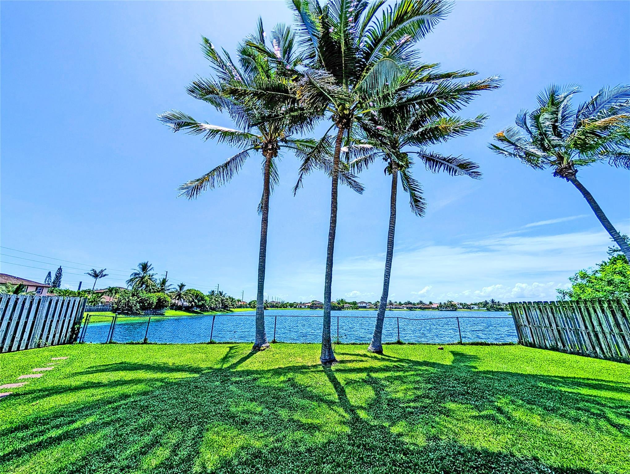 Spectacular lake front home in exclusive Lake Frances subdivision. Stunning views. Beautiful backyard. Okay for canoeing, kayaking, boating (electric), swimming, or fish for your dinner. NO HOA means no constantly rising high fees and greater flexibility to have your home your way. Easy access to major roads and the Turnpike. Close to grocery stores, retail big box outlets, restaurants and fast food establishments, and dental and medical facilities. Bored? You’re just minutes away from the Keys, Homestead Speedway, Blackpoint Marina, bike trails and much, much more. More than just a home, it’s a resort style feel on a beautiful waterfront lot. Homes like this are rare. Come. See. Experience this home for yourself and make this house-your home. Thank you for your visit.
