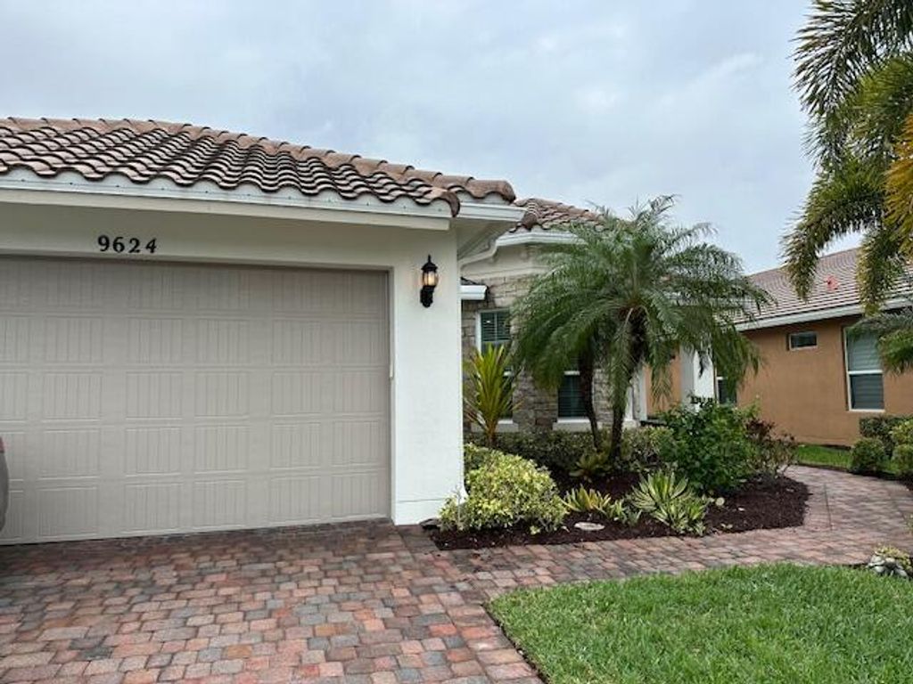 Photo of 9624 SW Royal Poinciana Drive, Port Saint Lucie, FL 34987 (MLS # R10948997)