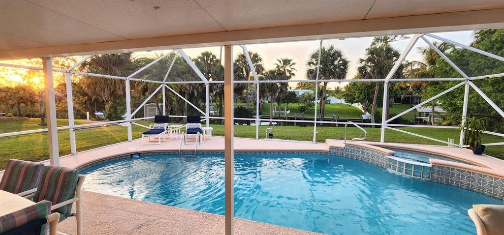 Photo of 131 NE Naranja Avenue, Port Saint Lucie, FL 34983 (MLS # R10975047)