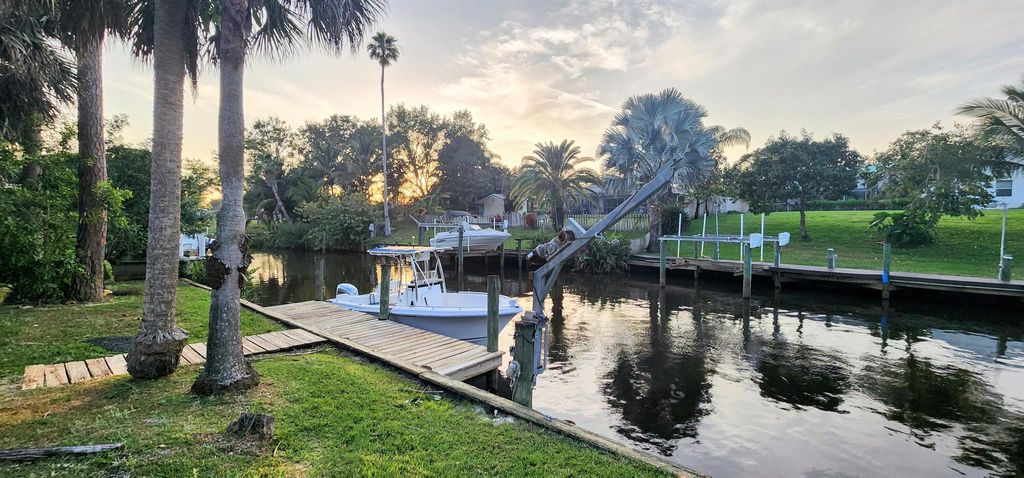 Photo of 131 NE Naranja Avenue, Port Saint Lucie, FL 34983 (MLS # R10975047)