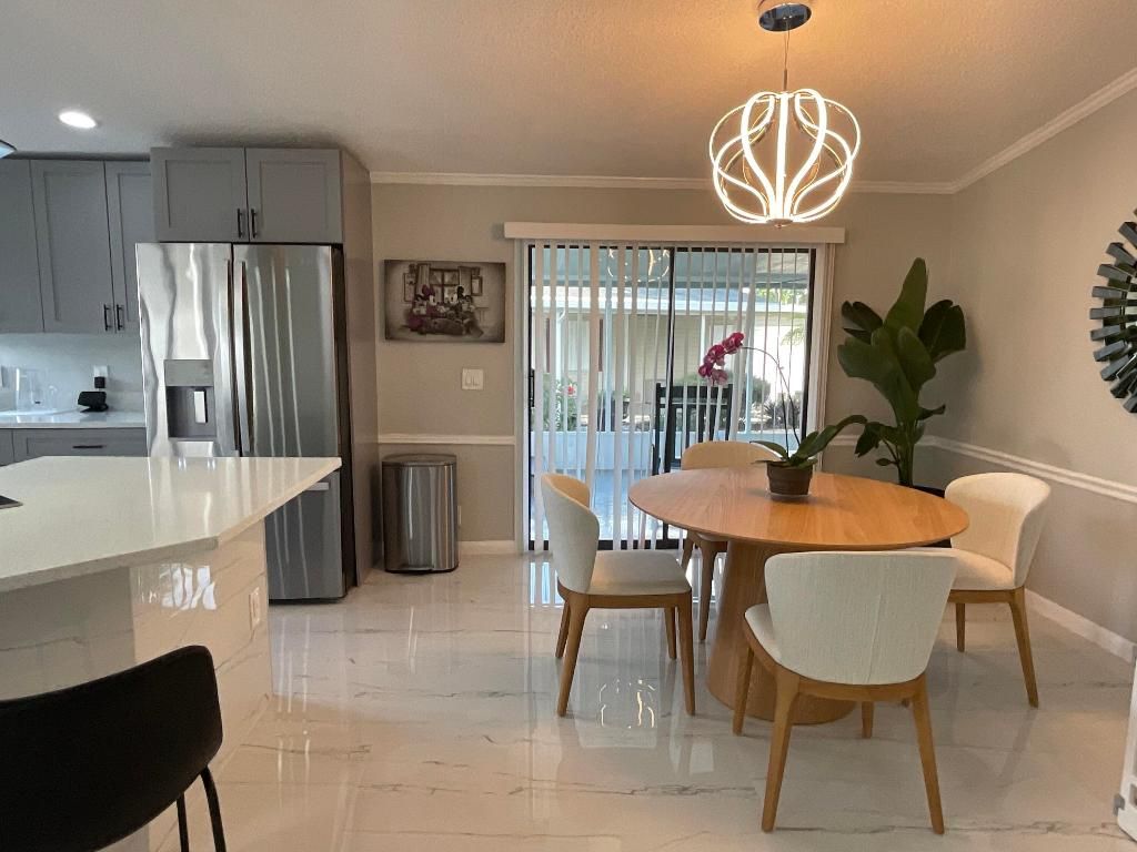 Photo of 920 Sun Acres Lane, Boynton Beach, FL 33436 (MLS # R11129537)