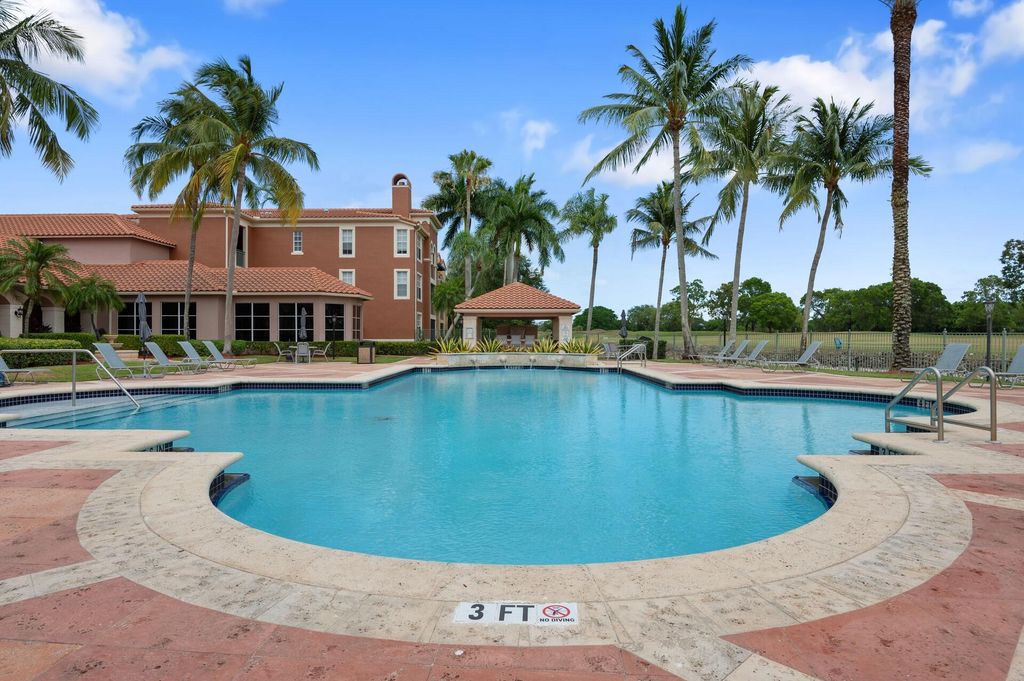 Photo of 11780 Saint Andrews Place #103, Wellington, FL 33414 (MLS # R11019671)