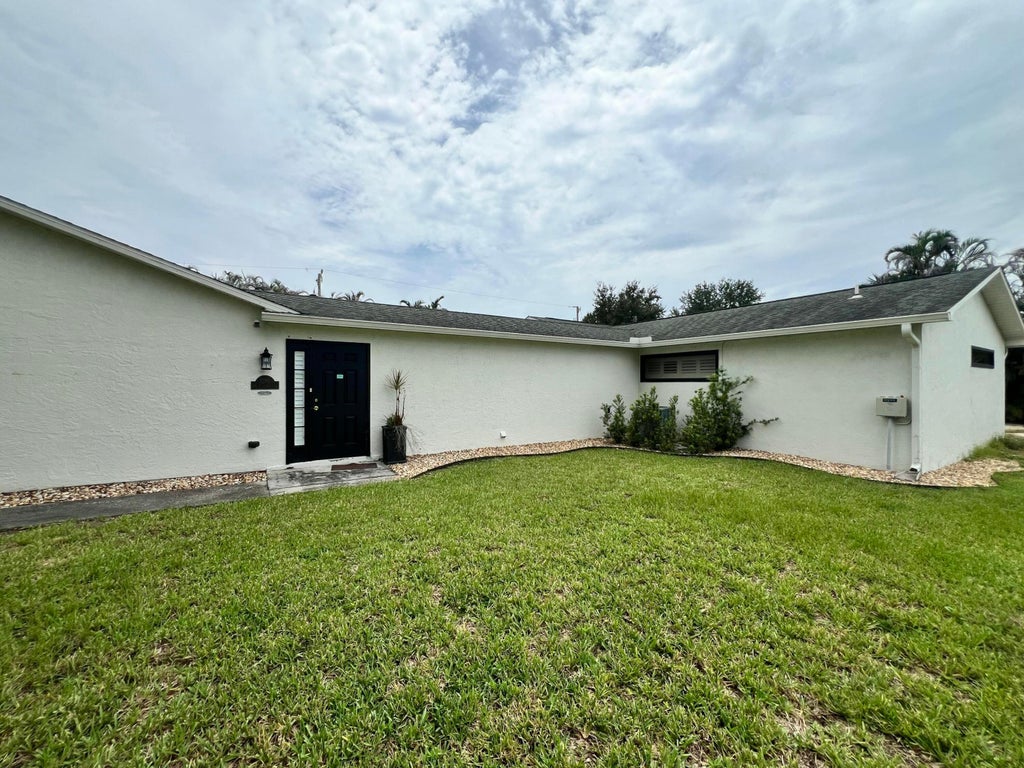 Photo of 1290 SW FLETCHER Lane, Port Saint Lucie, FL 34953 (MLS # B26058909)