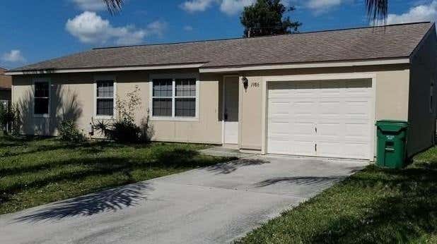 Photo of 1986 SE Dranson Cir, Port Saint Lucie, FL 34952 (MLS # F10329208)