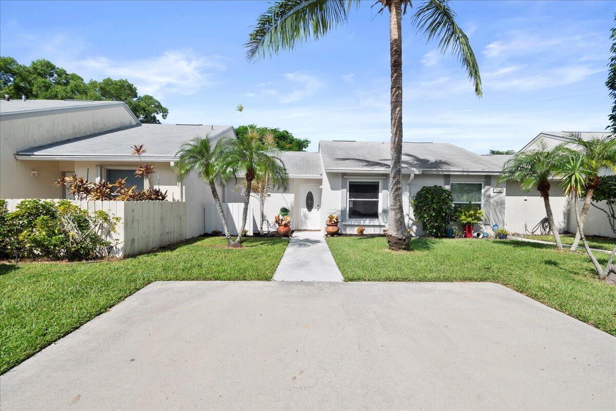 Charming one bedroom villa. Stands very much like a single family home in a very desirable location. Tile throughout. Granite countertop. Stained wood cabinets. Full extension drawers and pull-outs. Plenty of storage. CBS. Dishwasher (2024), SS refrigerator (2023), Front door (2019), Roof (2018), Windows and sliding door (2012). Tons of natural light. Fresh interior/exterior paint. Community pool. Close to shopping, restaurants, beach, I-95, Turnpike. One of a kind!!!! Must see!!!