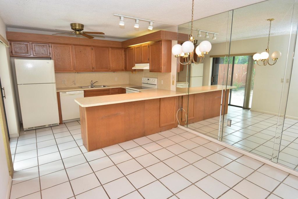Photo of 5806 SE Windsong Lane #217, Stuart, FL 34997 (MLS # R11134998)