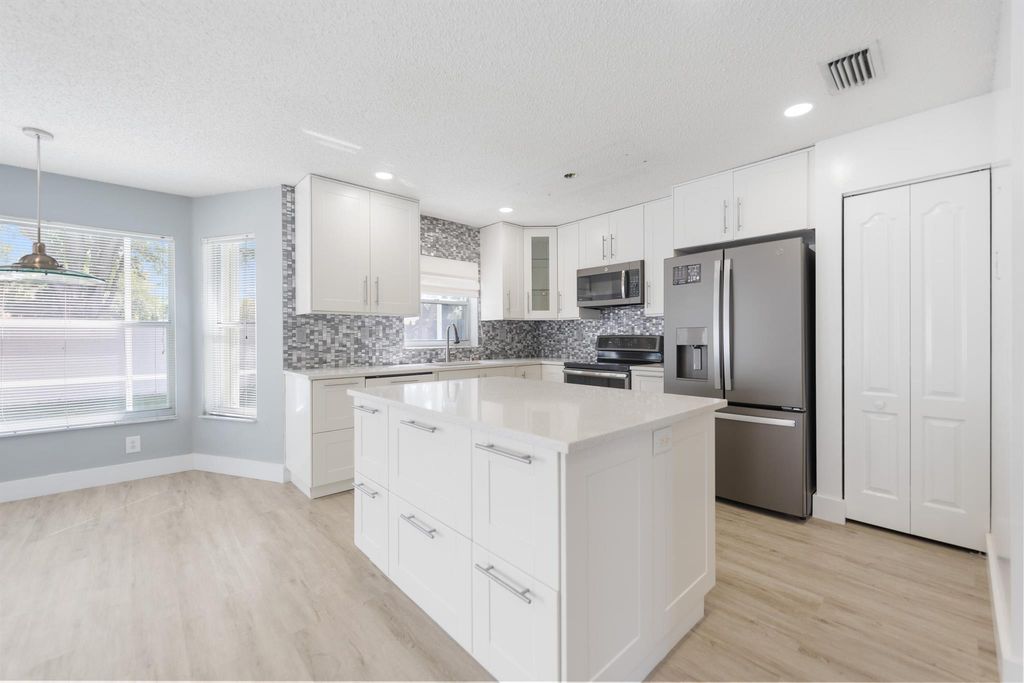 Photo of 10970 Crescendo Circle, Boca Raton, FL 33498 (MLS # R11072204)