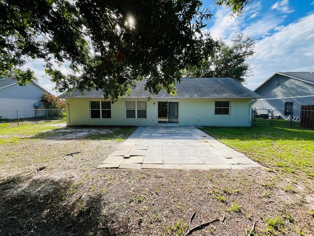 Photo of 2074 SW Aladdin Street, Port Saint Lucie, FL 34953 (MLS # R10995998)