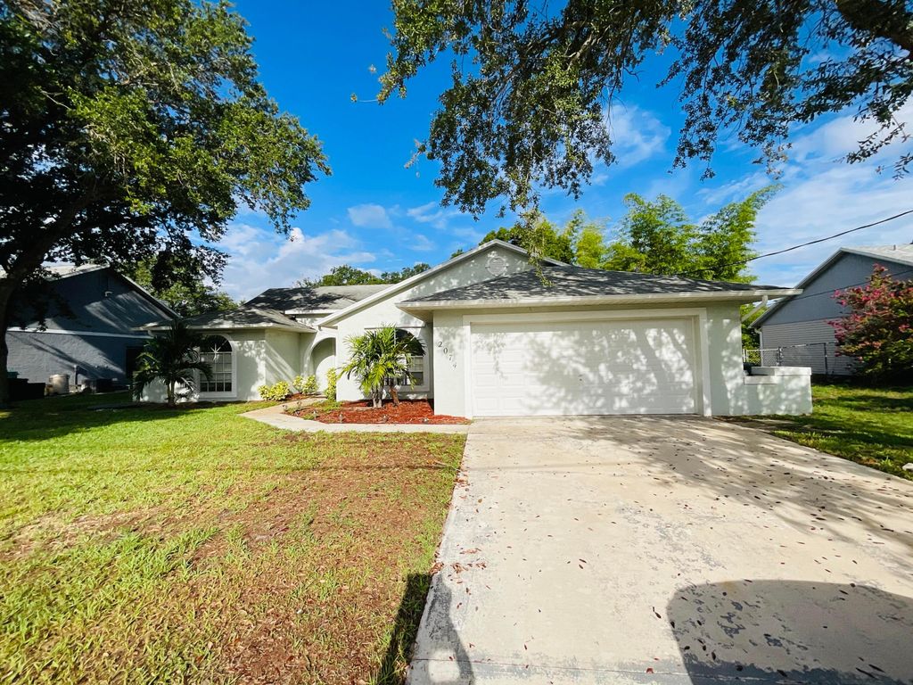 Photo of 2074 SW Aladdin Street, Port Saint Lucie, FL 34953 (MLS # R10995998)