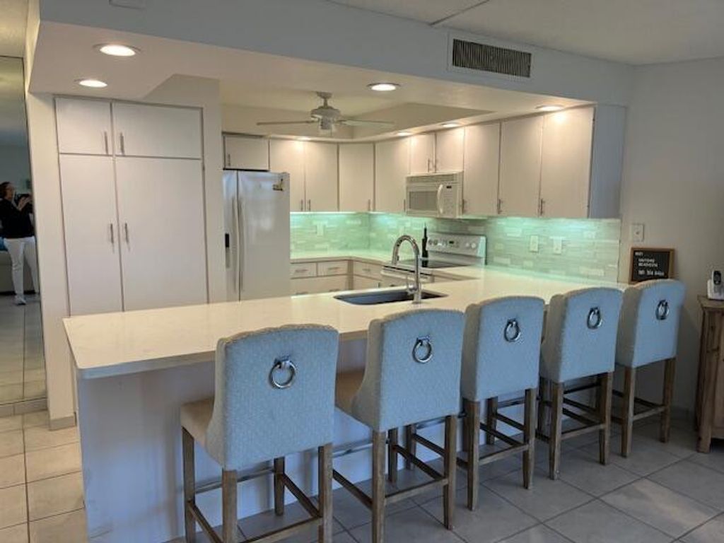 Photo of 2800 N Ocean Drive #B-4b, Singer Island, FL 33404 (MLS # R11124725)