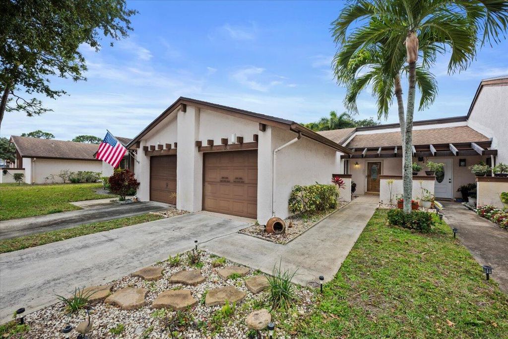 Photo of 6138 Elsinore Circle, Greenacres, FL 33463 (MLS # R11163659)