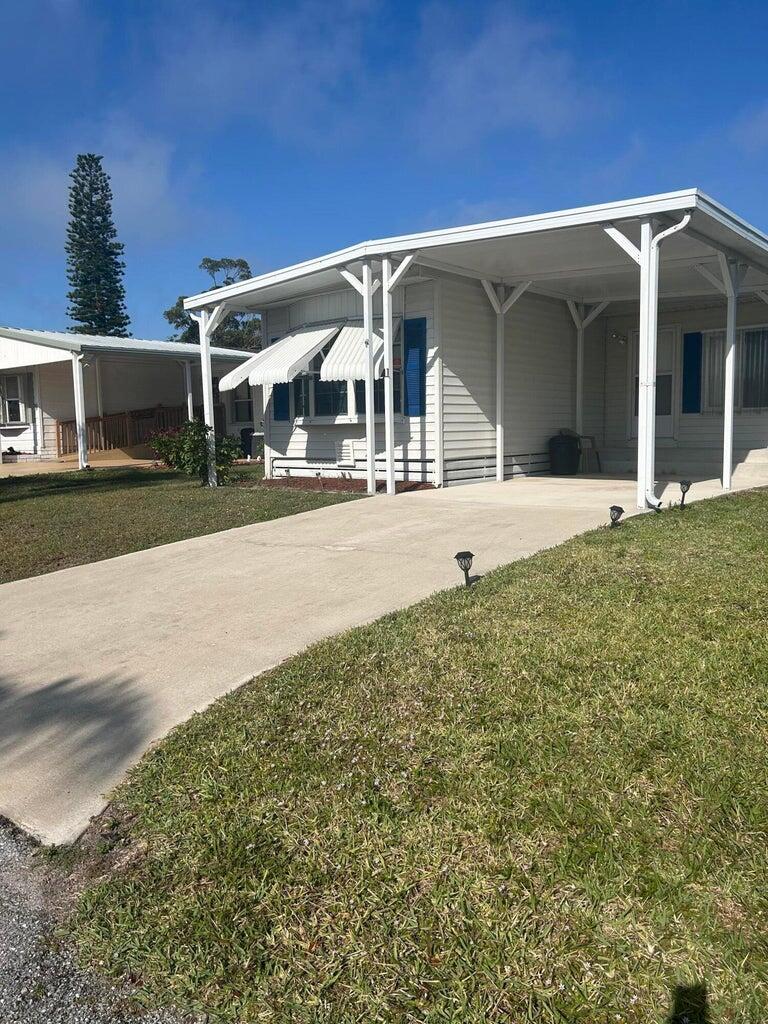 This is a manufactured home in a 52+ and over community. very clean furnished and cozy. Its located in Spanish Lakes Golf Village Section. SPANISH LAKES IS A GOLFING COMMUNITY, CLUBHOUSE ACTIVITIES,SWIMMING POOLS , TENNIS AND MUCH MORE.