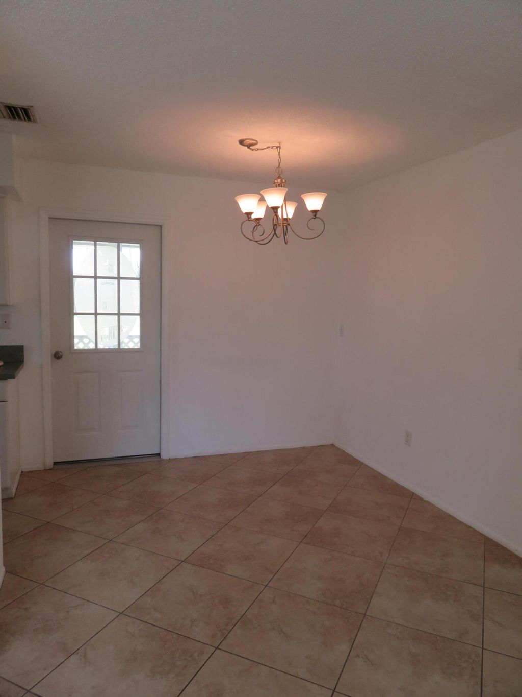 Photo of 262 NE Camelot Drive, Port Saint Lucie, FL 34983 (MLS # R10961426)