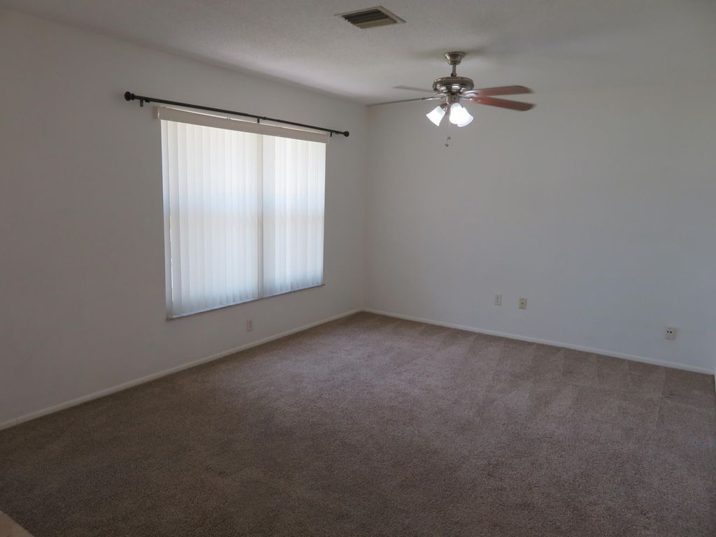 Photo of 262 NE Camelot Drive, Port Saint Lucie, FL 34983 (MLS # R10961426)