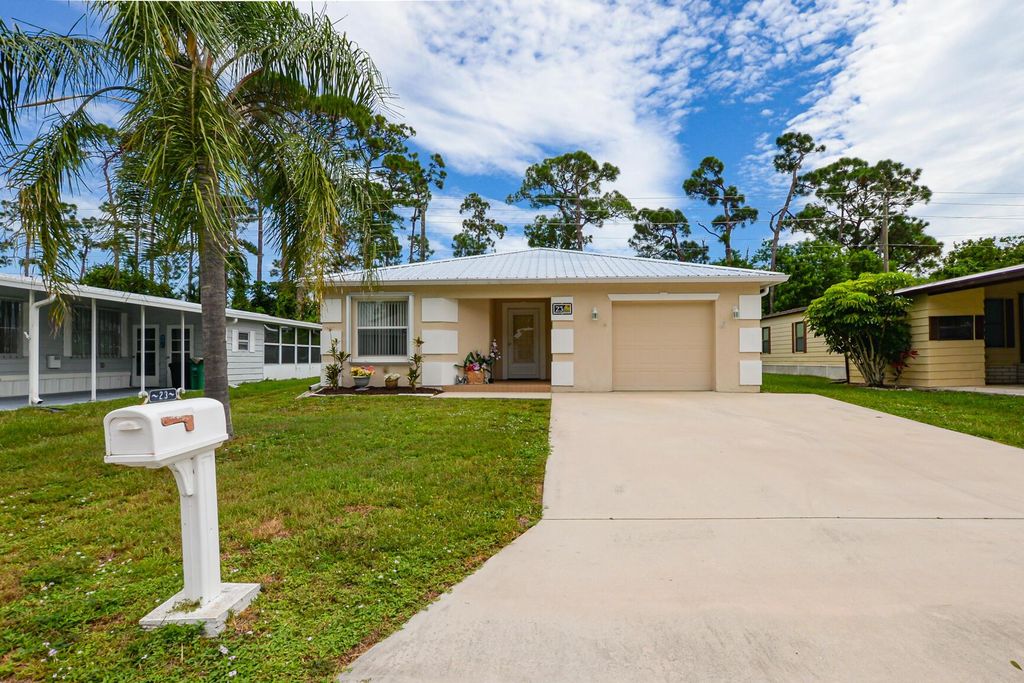 Photo of 23 La Puerta Del Norte, Fort Pierce, FL 34951 (MLS # R10911886)