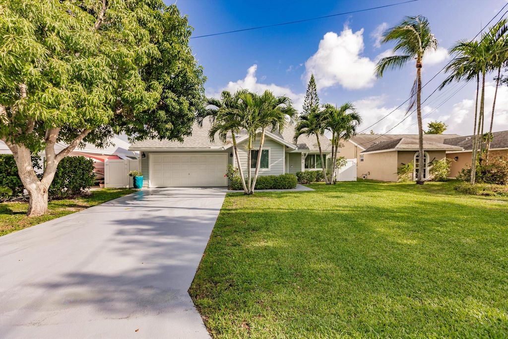 Photo of 6319 Garrett Street, Jupiter, FL 33458 (MLS # R11077613)