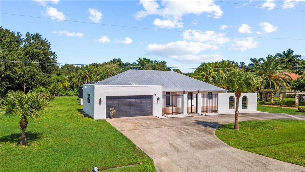 Photo of 2812 SE Farley Road, Port Saint Lucie, FL 34952 (MLS # R11022383)