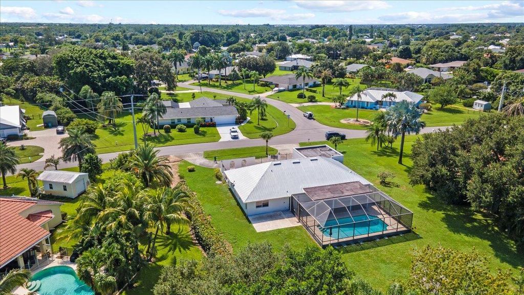 Photo of 2812 SE Farley Road, Port Saint Lucie, FL 34952 (MLS # R11022383)