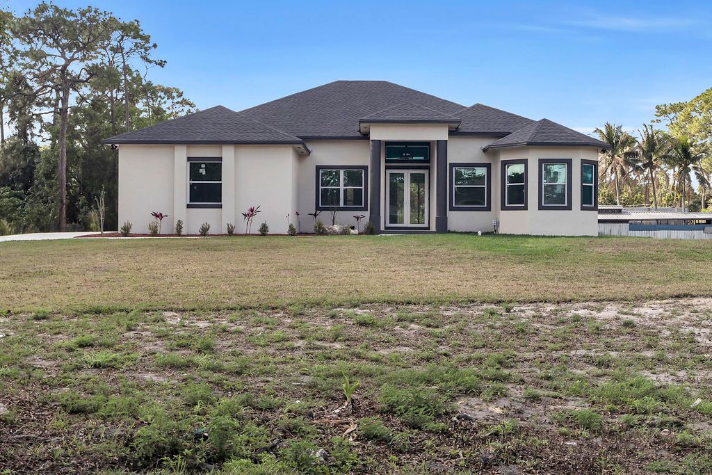 Photo of 15174 69th Court N, Loxahatchee, FL 33470 (MLS # R11169616)