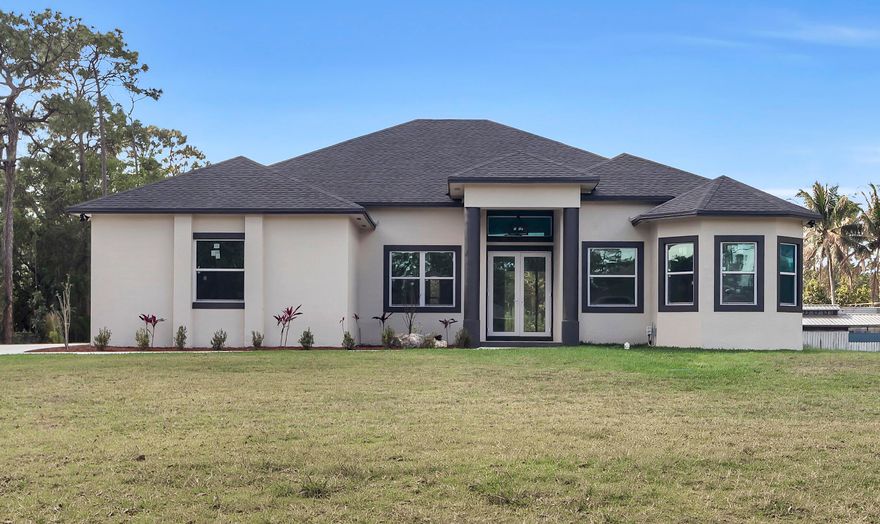 We invite you to come see this amazing brand new construction CBS construction home in one of the best locations in Loxahatchee. This luxurious 4 bedroom, 3 bath residencewith 2600 square feet under air boasts generous
High-end tile floors and bathrooms with quality hurricane impact windows and a concrete poured wide driveway situated on a high large lot. Don't miss this incredible opportunity. Newly listed today... we will have professional photography coming in the next few days. Come see this while it lasts!