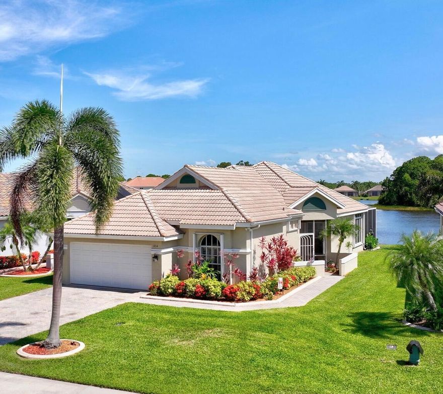 What a Gorgeous Water View from this completely remodeled home in the gated community of Lake Charles located in St Lucie West. From the moment you enter, you will find wood look luxury vinyl throughout, Custom baseboards, and fresh paint.The kitchen has been transformed with new 42 inch white shaker cabinets, granite tops, tile backsplash, and stainless appliances with water views everywhere. The bathrooms have been updated with new vanities. The primary bath also has been updated with a new shower. Some of the special features of this beautiful home include a newer screened lanai, Extended paver driveway, accordion shutters, personal dock for your canoe, and updated fixtures and fans. In Lake Charles, you are permitted to have non gas powered boats that can be stored in your back yard.