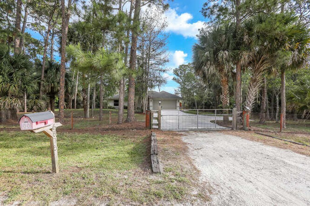 Photo of 16875 63rd Road N, Loxahatchee, FL 33470 (MLS # R10792458)