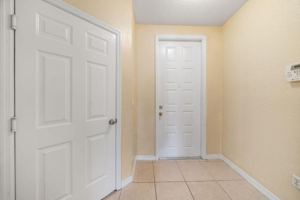 Photo of 1927 Alamanda Way, Riviera Beach, FL 33404 (MLS # R11144973)