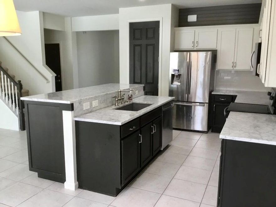 Look no furthur!This 4 bedroom Pulte home in Heron Bay is a beauty from the moment you walk in.The kitchen has been update with Carrara Marble and custom center 36'' high pull out cabinets.The triple slider opens to a custom build oasis with a heated salt water pool and outdoor kitchen.For the avid golfer in the family there is putting green in the backyard for the gardener in the family there are separately watered plant boxes to boast your prized vegetation. 
Master has two customized walk in closets. Please check out the virtual tour too!