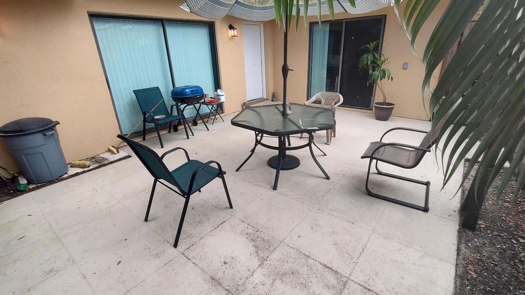 Photo of 5646 SE Windsong Lane #415, Stuart, FL 34997 (MLS # R11140727)