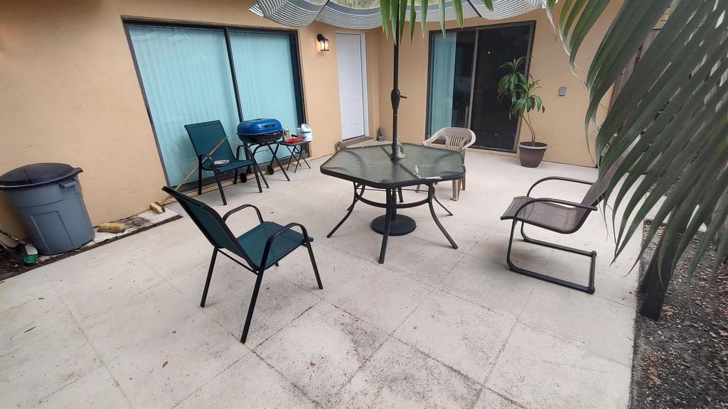 Photo of 5646 SE Windsong Lane #415, Stuart, FL 34997 (MLS # R11140727)