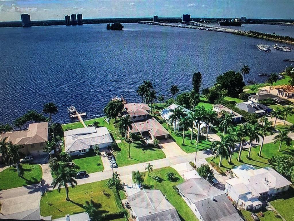 $2100/month lease with option to purchase! Bring your boat to this 3/2 deep waterfront sailboat ocean access Florida home. Owner will finance with 10% down and apply $500/month of the lease going toward future down payment! No fixed bridges and just minutes to Caloosahatchee River, Gulf, and Ocean for incredible fishing. Enjoy mature Royal Palms and exotic fruit trees while watching the manatees on your oversized dock with boat lift. Downtown historic Ft. Meyers with its arts and nightlife is a short ride by boat or car. No showings til Sat April 16th. Don't miss it! Early offers welcome