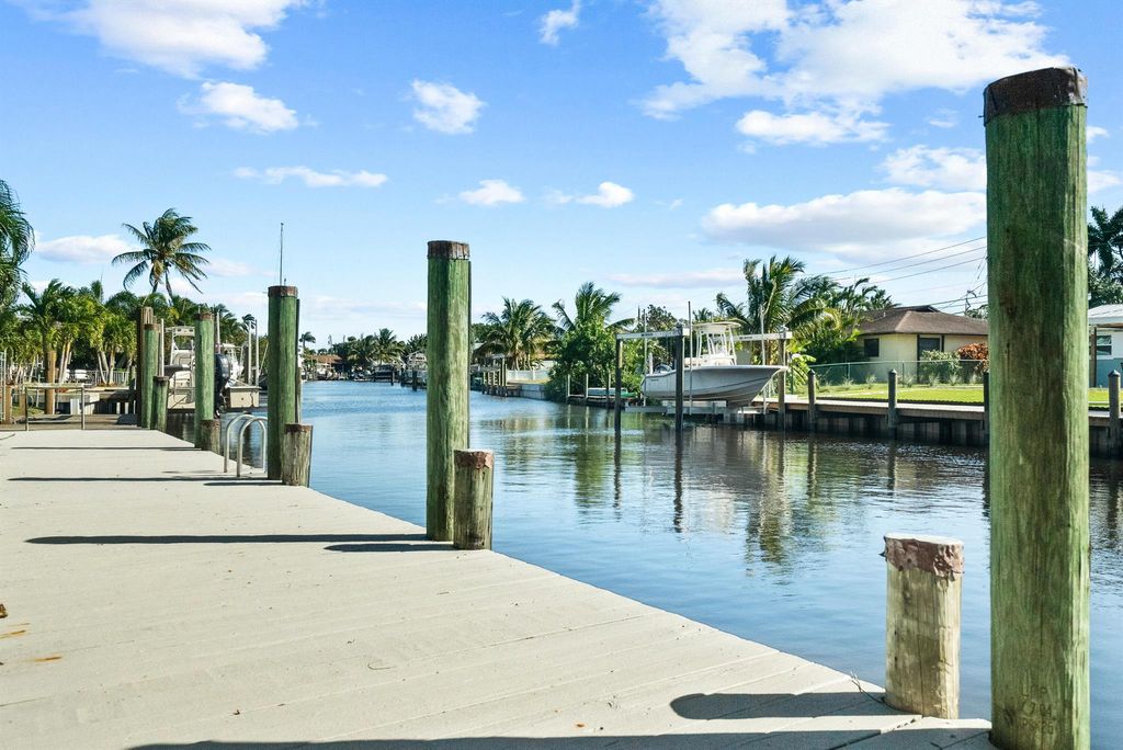 Photo of 1354 SW Seagull Way, Palm City, FL 34990 (MLS # R10988821)