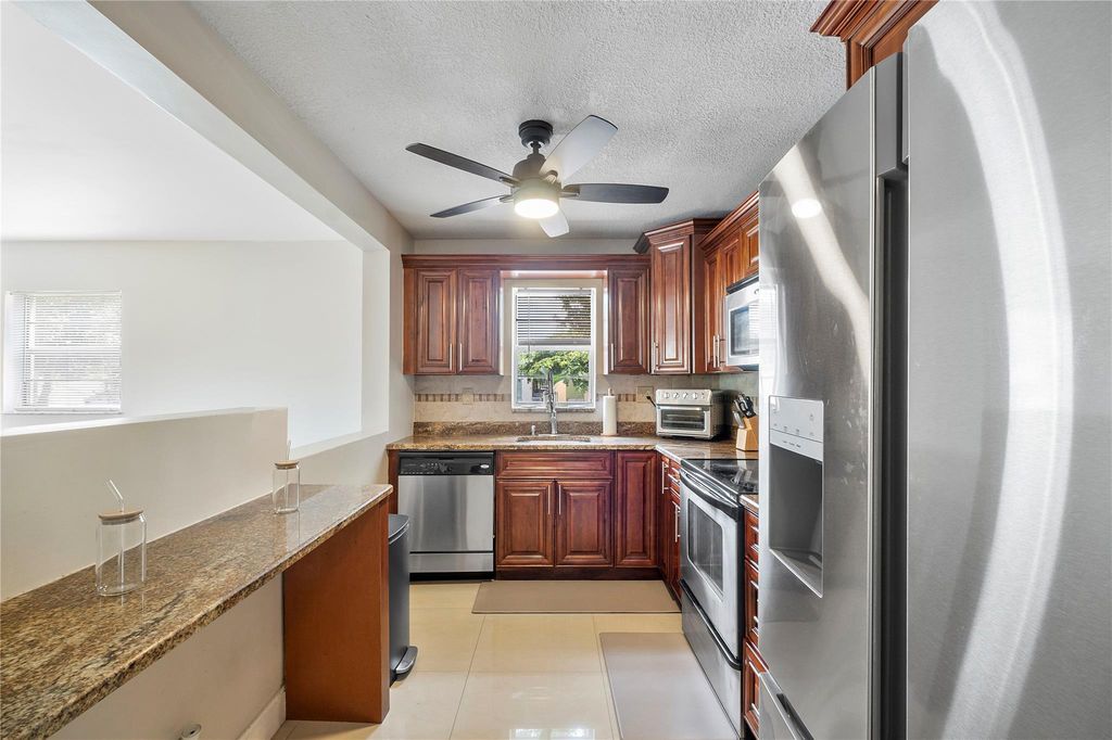 Photo of 4154 NW 90th Ave #201, Coral Springs, FL 33065 (MLS # F10532018)
